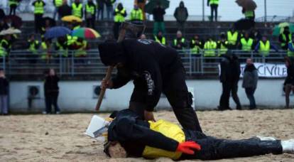 "Yellow vests" symbolically "beheaded" Macron