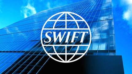 Америка угрожает наказать SWIFT