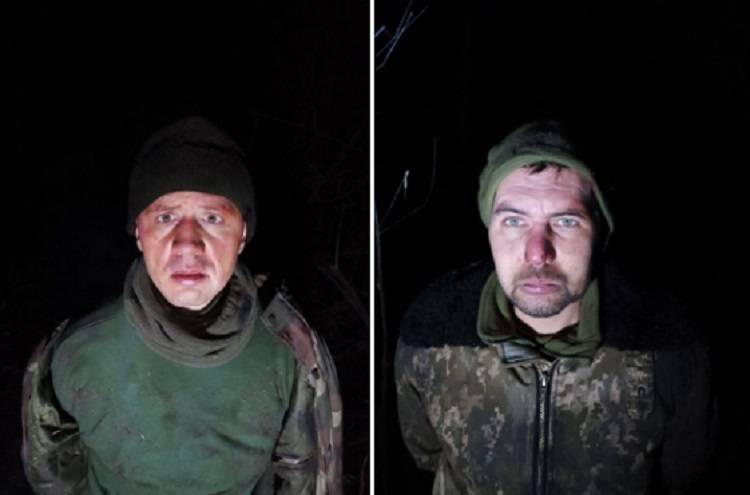 Ukrainian soldiers who surrendered in the west of the LPR hide their belonging to the 80th brigade of the Armed Forces of Ukraine